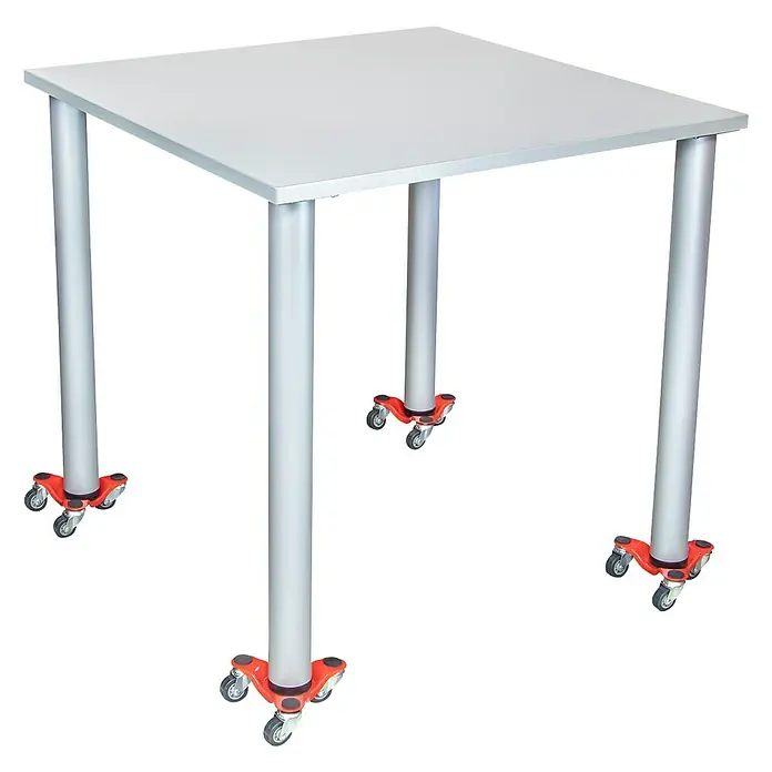 Wagner System Transportroller MM 1193 - L x B x H: 160 x 160 x 60 mm, Traglast: 60 kg, Stahl - Quadratischer Tisch mit silberner Platte und vier Beinen mit roten Rollenfüßen. Ein vielseitiges Möbelstück für verschiedene Anwendungen.