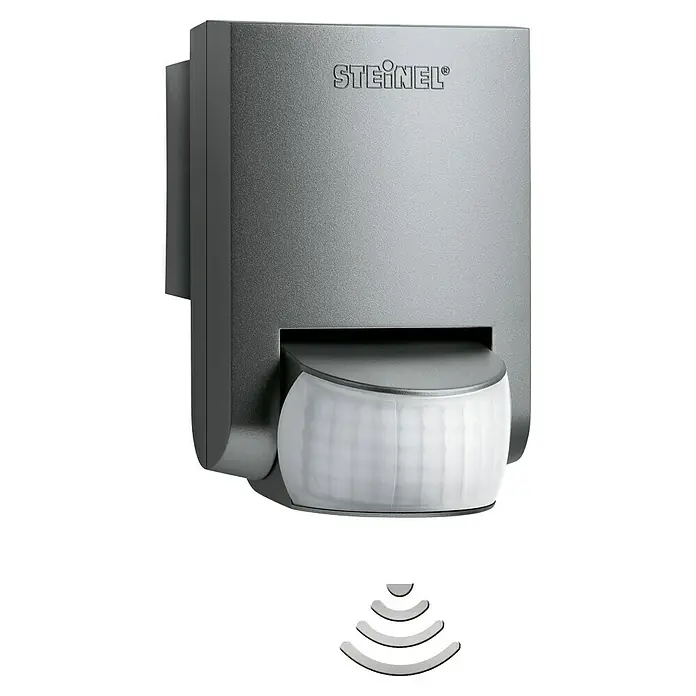 Steinel Bewegungsmelder IS 130-2 anthrazit - Reichweite Sensor: 12 m, Anthrazit, Erfassungswinkel Sensor: 130 °, L x B x H: 8,7 x 7,8 x 8,4 cm - Ein silberner Steinel Bewegungsmelder mit einem abgerundeten Sensor an der Unterseite.