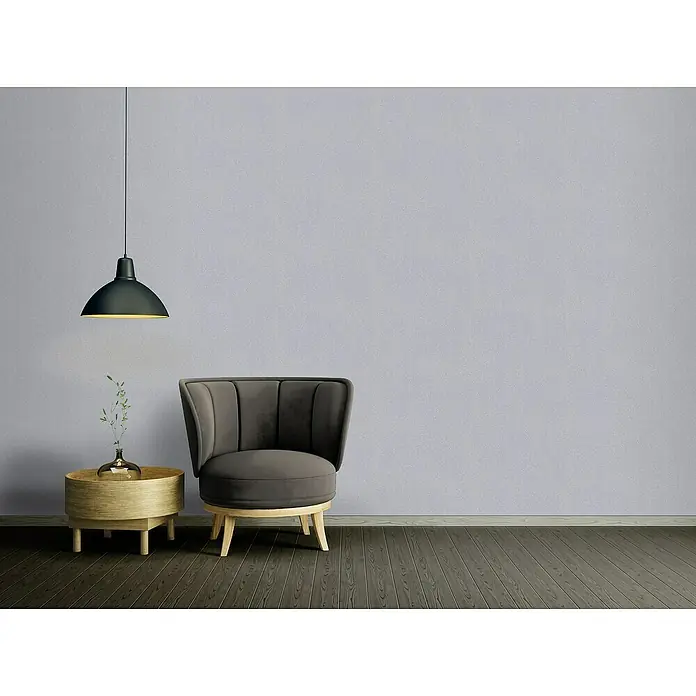 A.S. Création New Elegance Vliestapete I - Grau, Uni, 10,05 x 0,53 m - Elegante Inneneinrichtung mit einem grauen Sessel, einem runden Beistelltisch und einer stilvollen Hängelampe.
