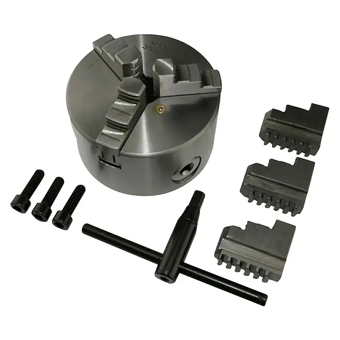 Rotwerk Backenfutter EDM 300 DS - Passend für: Rotwerk Drehmaschinen EDM 300 DS/350 DR/350 BL - Das Bild zeigt ein Drehmomentschloss-Set, bestehend aus einem Drehmomentschloss, drei Backen, Schrauben und einem Schraubenschlüssel.