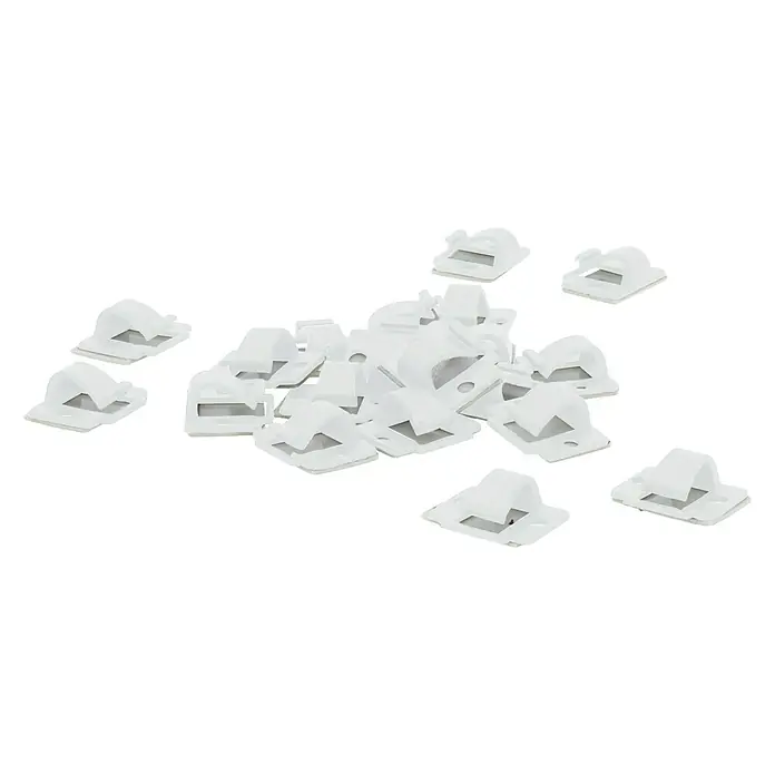 Voltomat Kabelklemme - Weiß, 14 x 20 mm, Kunststoff, 20 Stk. - Nahaufnahme einer Ansammlung von weißen selbstklebenden Kabelclips, die auf einer schwarzen Oberfläche angeordnet sind und eine praktische Lösung für die Kabelführung bieten.