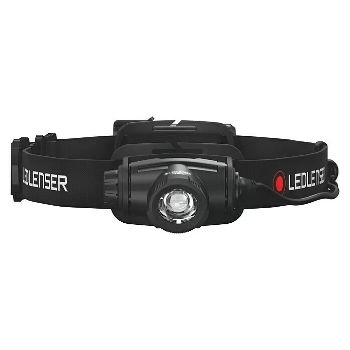 Ledlenser Linterna frontal H5 Core - 15 lm - 350 lm, IP67 - Linterna frontal negra con lente transparente y correa ajustable negra, con el logo "LEDLENSER" en blanco y un círculo rojo.