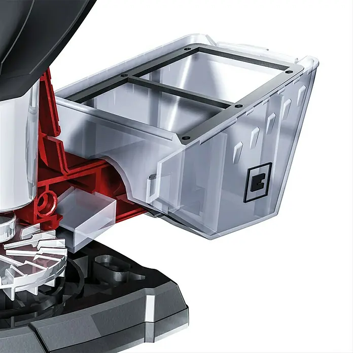 Einhell PXC 18V Multilijadora de batería TE-OS 18/150 Li - Solo - 18 V, Sin batería, Iones de litio, 24.000 r.p.m. - Primer plano de una caja de recolección de polvo transparente adjunta a una sierra roja y negra, limpieza del espacio.