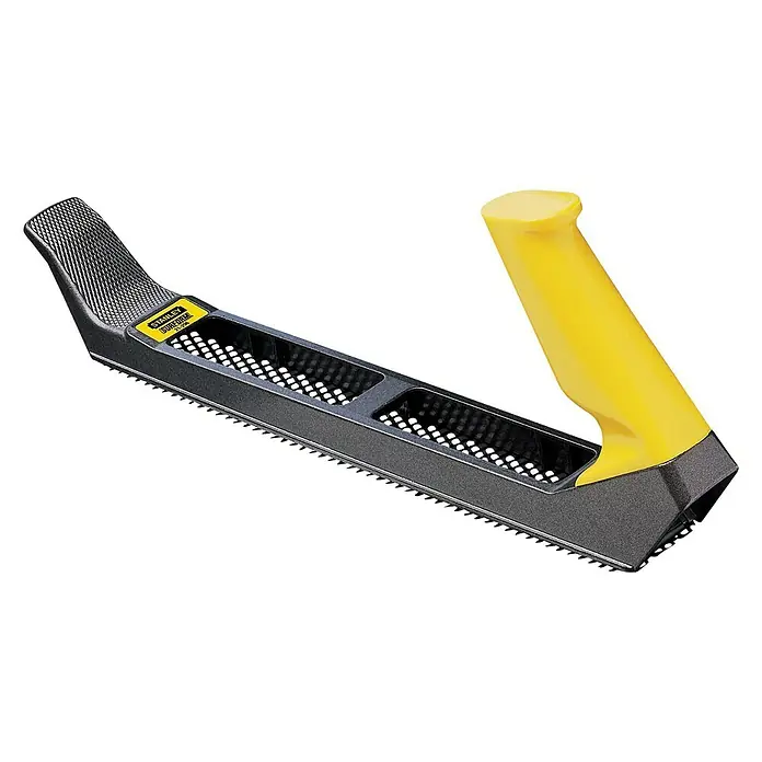 Stanley Kombihobel Surform - Kunststoff - Nahaufnahme eines Stanley Surform Hobels mit gelbem Griff. Perfekt zum Formen von Holz und anderen Materialien.