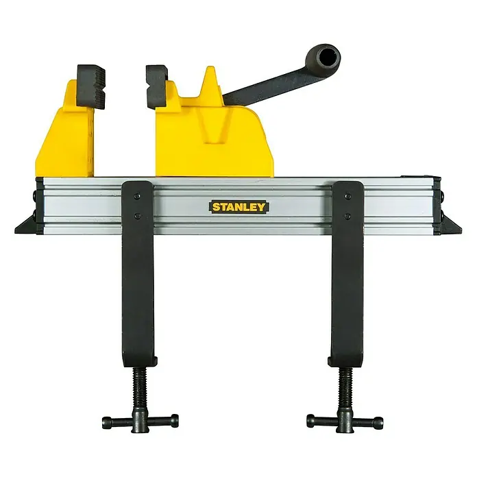 Stanley Schraubstock 0-83-179 - Spannweite: 115 mm, Kunststoff - Eine Stanley-Werkbank mit gelbem Schraubstock und schwarzen Drehgriffen für präzises Arbeiten.