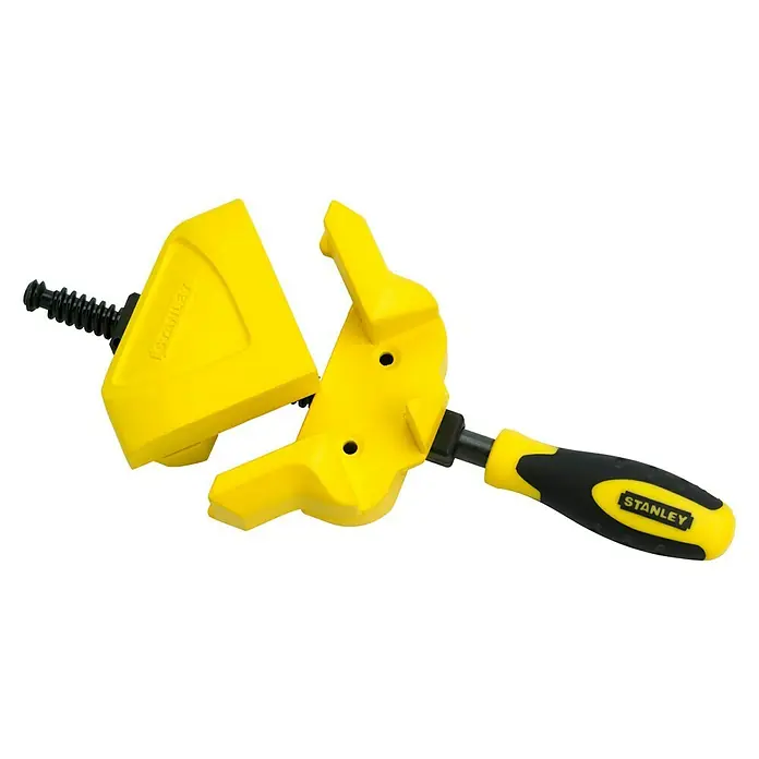 Stanley Winkelspanner - Ausladung: 30 mm, Spannweite: 57 mm - Bild einer gelben Stanley Eckzwinge, die für präzise Eckverbindungen entwickelt wurde. Ideal für Holzbearbeitung und Heimwerkerprojekte.