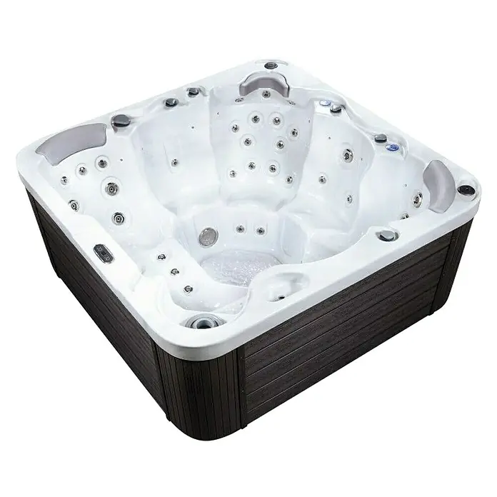 Camargue Außen-Whirlpool Harmony - 200 x 200 x 87 cm, Grau/Weiß, Max. Personenzahl: 6 - Dieses Bild zeigt einen luxuriösen Whirlpool mit grauem Gehäuse und zahlreichen Düsen für ein entspannendes Badeerlebnis.