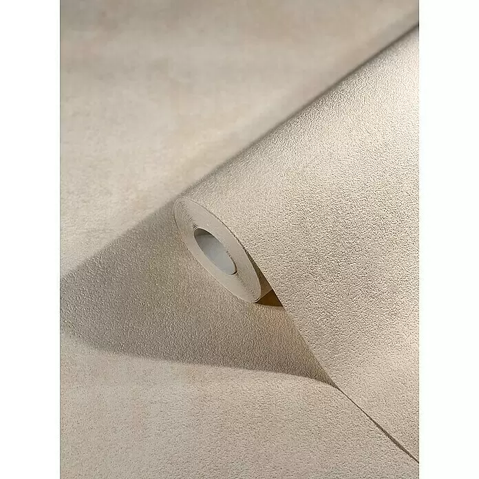 SCHÖNER WOHNEN-Kollektion New Spirit Vliestapete - Creme, Uni, 10,05 x 0,53 m - Beige strukturierte Tapetenrolle, teilweise abgerollt, zeigt ihre Oberfläche.