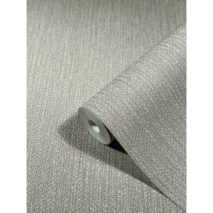 SCHÖNER WOHNEN-Kollektion New Spirit Vliestapete Struktur - Mittelgrau, Uni, 10,05 x 0,53 m - Nahaufnahme einer Rolle grauer Tapete mit subtiler Textur und einem modernen Look, ideal für stilvolle Innenräume.