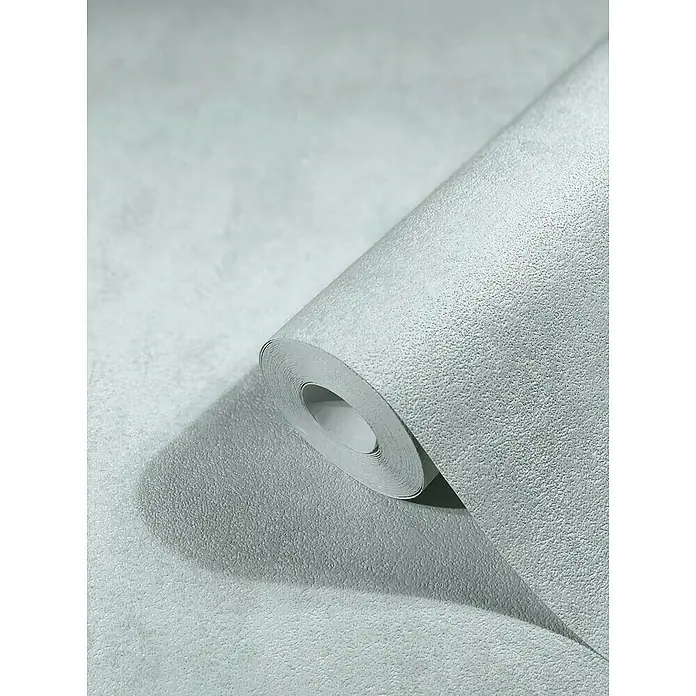 SCHÖNER WOHNEN-Kollektion New Spirit Vliestapete - Hellgrau, Uni, 10,05 x 0,53 m - Nahaufnahme einer Rolle eleganter, grauer Tapete mit feiner Textur, perfekt für ein stilvolles Interieur.