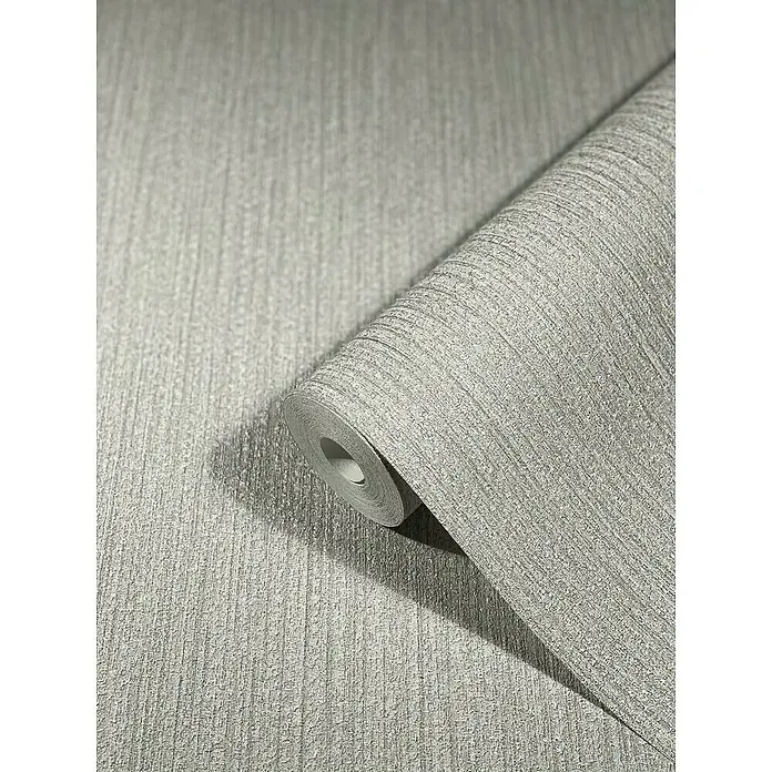 SCHÖNER WOHNEN-Kollektion New Spirit Vliestapete Struktur - Hellgrau, Uni, 10,05 x 0,53 m - Nahaufnahme einer Rolle grauer, strukturierter Vinyltapete, die sich perfekt für die Dekoration eignet. Strapazierfähige und stilvolle Wandverkleidung.