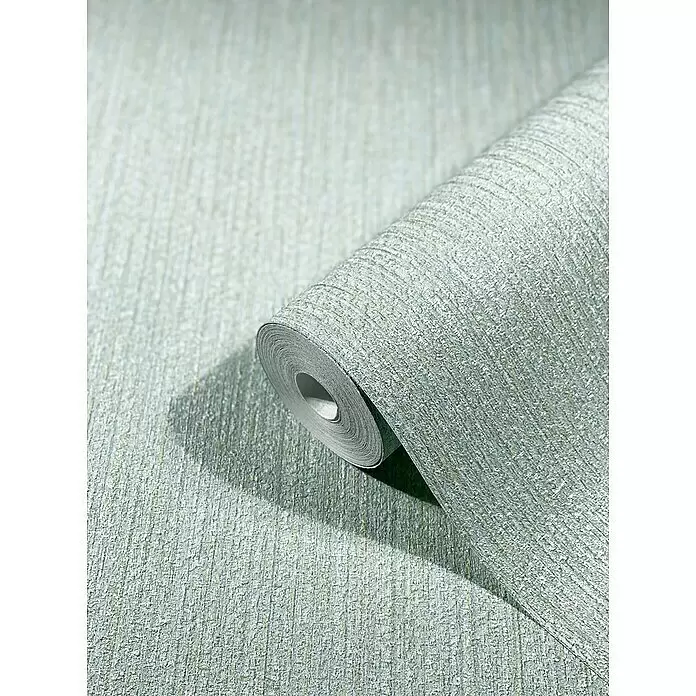 SCHÖNER WOHNEN-Kollektion New Spirit Vliestapete Struktur - Hellgrün, Uni, 10,05 x 0,53 m - Rolle strukturierter, hellgrün-blauer Tapete, teilweise abgerollt, um ihre schimmernde Oberfläche zu zeigen.