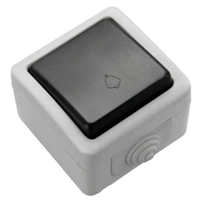Fontini Pulsador para estancias con humedad -  - Primer plano de un botón de timbre robusto y resistente a la intemperie con un símbolo de campana en el botón negro, ideal para exteriores.