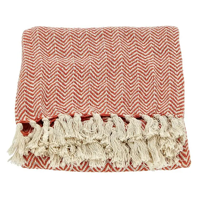Decke Zigzag - Rostrot, 170 x 130 cm, 100 % Baumwolle - Gefaltete, korallenrote Tagesdecke mit Fischgrätenmuster und Fransen für eine stilvolle Note in jedem Raum.