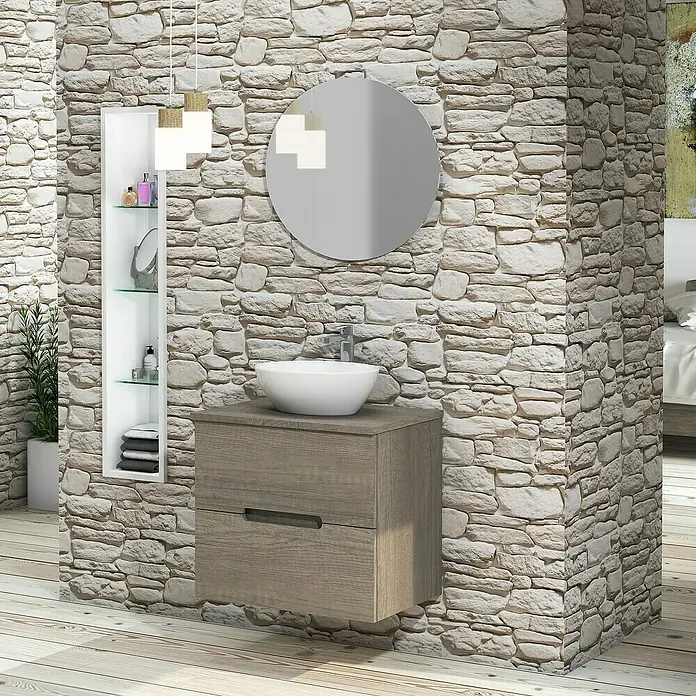Artysan Conjunto de mueble de baño Loop Top - Ancho: 60 cm, 4 pzs., Nebraska, Mate - Conjunto de baño con mueble bajo lavabo, espejo redondo y estante frente a pared de piedra.