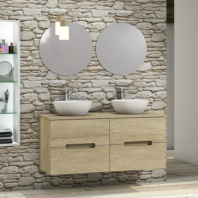 Artysan Conjunto de mueble de baño Loop Top - 6 pzs., Nature, Mate - La foto muestra un tocador con dos lavabos redondos de sobreponer y cajones frente a una pared de piedra, complementado con dos espejos redondos.