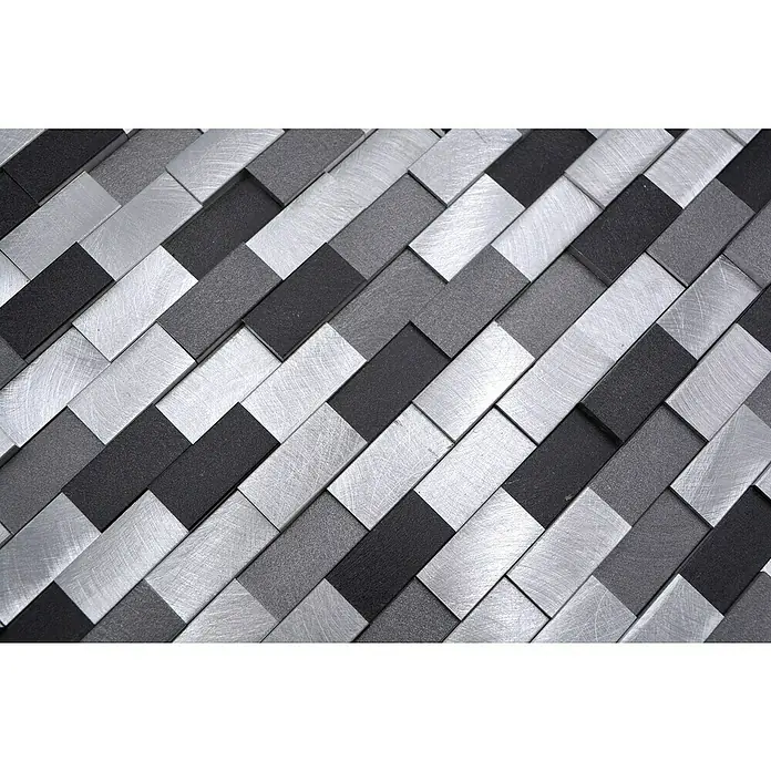 Mosaikfliese Brick 3D Mix XAM A132 - 30,1 x 30,4 cm, Silber/Schwarz, Matt - Ein abstraktes Wandbild aus metallischen Rechtecken in Silber, Grau und Schwarz, das ein modernes und stilvolles Design präsentiert.