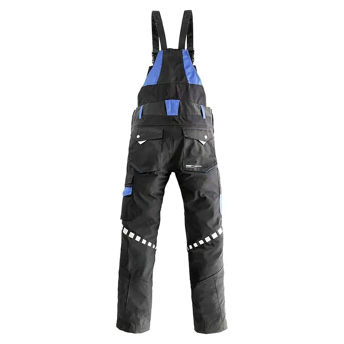 Puma Workwear Latzhose Champ - 52, Carbon - Schwarze Puma Arbeits-Latzhose mit blauen Akzenten und reflektierenden Details für optimale Sichtbarkeit und Funktionalität.