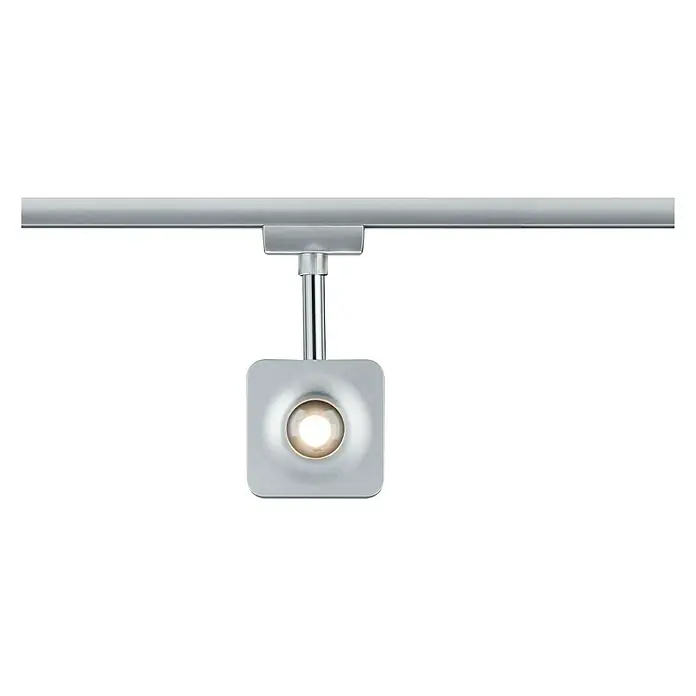 Paulmann URail Foco LED para riel Cubo - 8 W, Cromado mate, L x An x Al: 4,7 x 7,7 x 16,5 cm - Primer plano de un foco de carril moderno de color plateado con un diseño cuadrado y luz cálida, sobre un fondo negro.