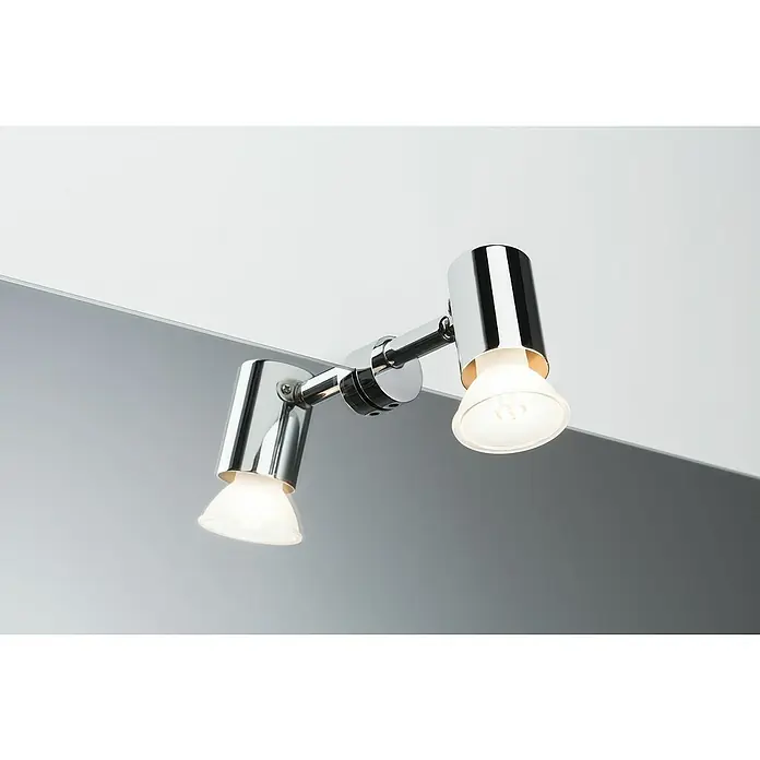 Paulmann Aplique para espejo Mintaka - 20 W, L x An x Al: 12 x 5,6 x 3,8 cm, Cromo - Primer plano de una lámpara de doble foco cromada con dos bombillas iluminadas montada en una pared.
