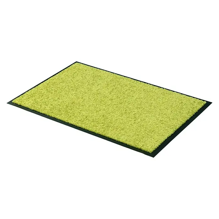 Astra Schmutzfangmatte Proper Tex - Grün, 40 x 60 cm, Material Nutzschicht: 100 % Polyamid - Nahaufnahme einer grünen Fußmatte mit schwarzem Rand auf einem schwarzen Hintergrund.