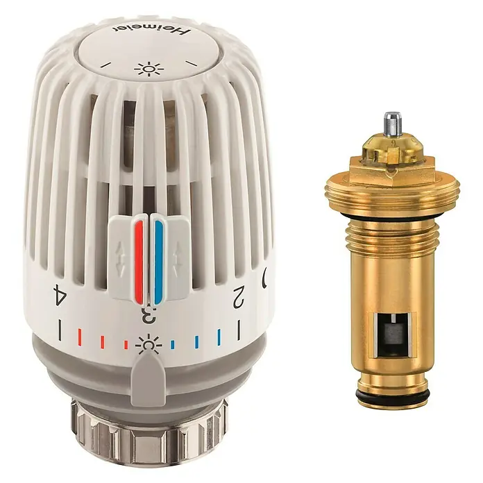Heimeier Thermostatventil-Set - ½″, 2 -tlg. - Ein Thermostatkopf von Heimeier neben einem Heizkörperthermostat-Ventileinsatz, beide für Heizungsregelungen.