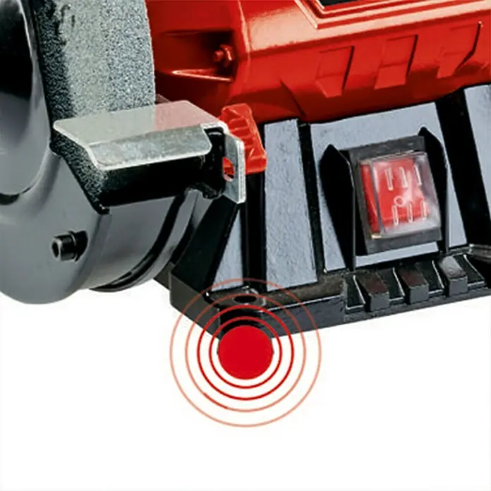 Einhell Esmeriladora doble eléctrica TC-BG 150 - 150 W, 2.980 r.p.m. - Primer plano de una amoladora de banco roja Einhell con un interruptor y una muela de metal.