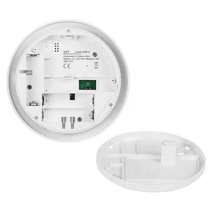 Homematic IP Sistema de alarma HmIP-ASIR-2 -  - Sirena de alarma Homematic IP blanca, parte trasera mostrando compartimentos de batería abiertos para 3xAA y una pequeña placa de circuito. La tapa trasera es visible.