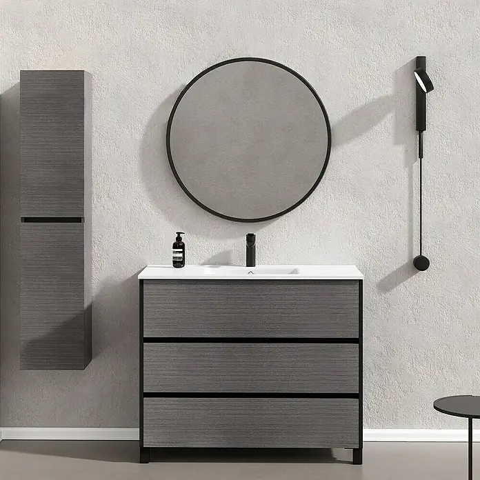 Artysan Conjunto de mueble de baño Africa - Ancho: 100 cm, 3 pzs., Ceniza, Mate - Mueble de baño moderno con textura de madera gris, espejo redondo y lámpara de pared para un ambiente elegante.