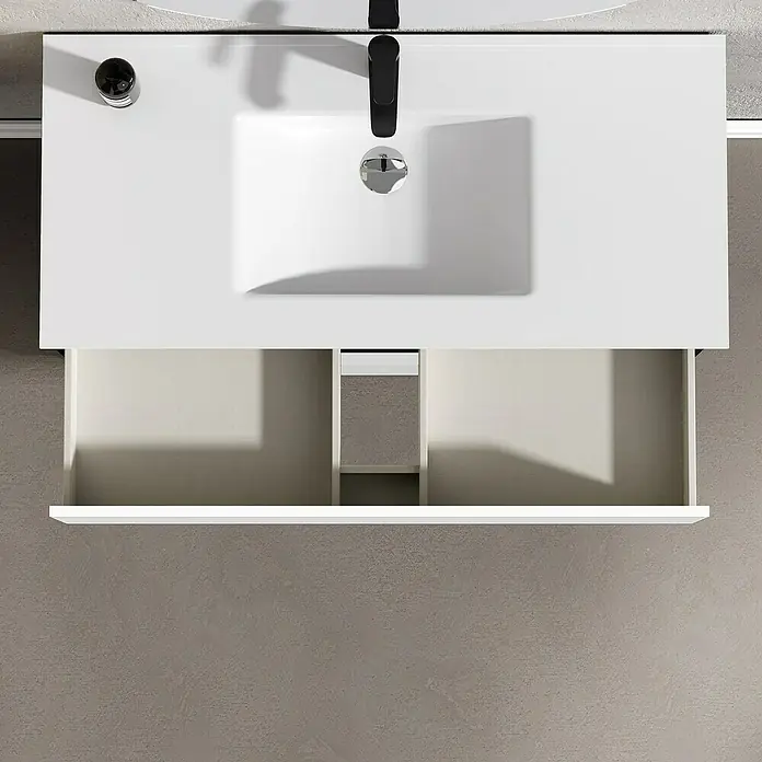 Artysan Conjunto de mueble de baño Africa - Ancho: 100 cm, 3 pzs., Blanco, Mate - Un mueble bajo lavabo blanco con un cajón abierto muestra la división interior y el almacenamiento en un diseño moderno.