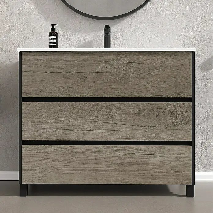 Artysan Conjunto de mueble de baño Africa - Ancho: 100 cm, 3 pzs., Nebraska, Mate - Un mueble de baño moderno con tres cajones y una encimera blanca, ideal para baños elegantes.