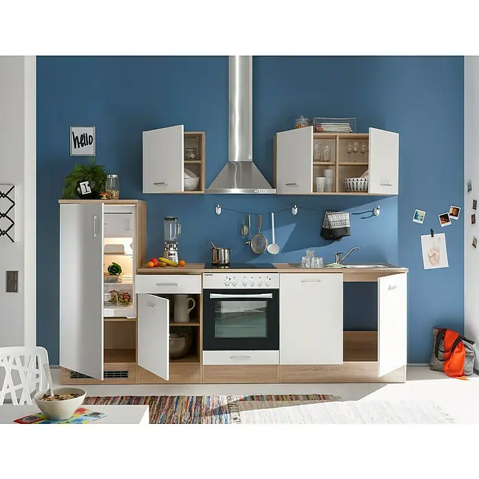 Respekta Küchenzeile Petunia - Breite: 270 cm, Weiß, Glaskeramikkochfeld, Mit Elektrogeräten - Ein modernes Küchendesign mit weißen Schränken und Geräten vor einer blauen Wand.