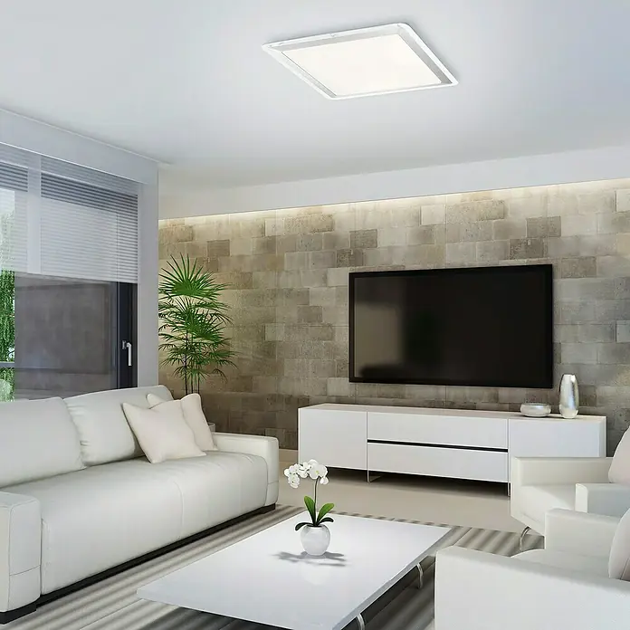 Paul Neuhaus LED-Deckenleuchte Labol - 12 W, L x B x H: 335 x 335 x 100 mm, Opal, Nickel, Warmweiß - Deckenleuchte in quadratischer Form mit weißem Rahmen und hellem Licht in einem modernen Wohnzimmer mit weißen Möbeln.