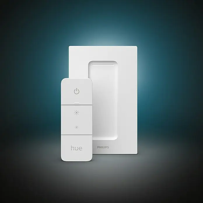 Philips Hue Dimmcontroller V2 - L x B x H: 1,5 x 8 x 12,5 cm - Abgebildet ist ein Philips Hue Dimmschalter mit zugehöriger Wandhalterung in strahlendem Weiß, ideal für eine smarte Lichtsteuerung.