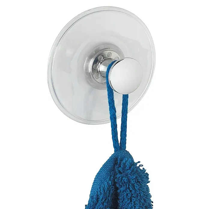 Wenko Saugnapf-Haken Arezzo - 1 Stk., Kunststoff, Transparent - Ein transparenter Saugnapf-Haken mit einem blauen Handtuch daran. Ideal für Badezimmer und Küche zur einfachen Befestigung.