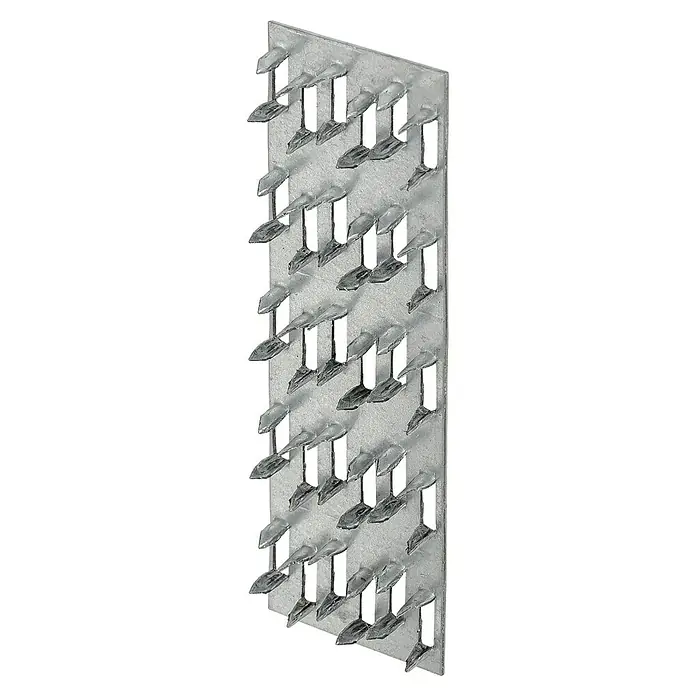 Vormann Flachverbinder - L x B: 127 x 38 mm - Eine Nahaufnahme einer Metallplatte mit einem Raster aus kleinen, metallischen Stacheln, die aus rechteckigen Öffnungen hervorragen.