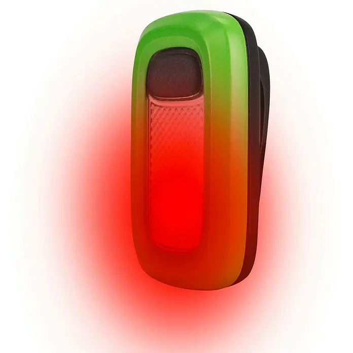 Energizer Linterna deporte - 2,25 x 10,8 x 16,5 cm, 30 lm, IPX4 - La imagen muestra una luz trasera con luz roja, adecuada para bicicletas u otras aplicaciones. Tiene un contorno verde y naranja.