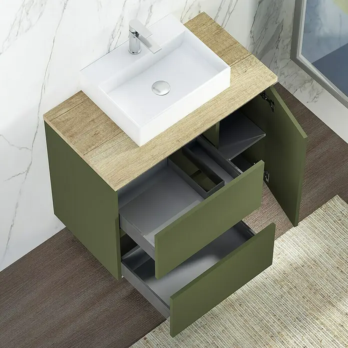 Artysan Mueble bajo de lavabo Farbe - 46 x 70 x 66 cm, Musgo - Toma de ángulo alto de un moderno mueble de baño con encimera de madera, cuerpo verde, dos cajones y compartimento abierto.