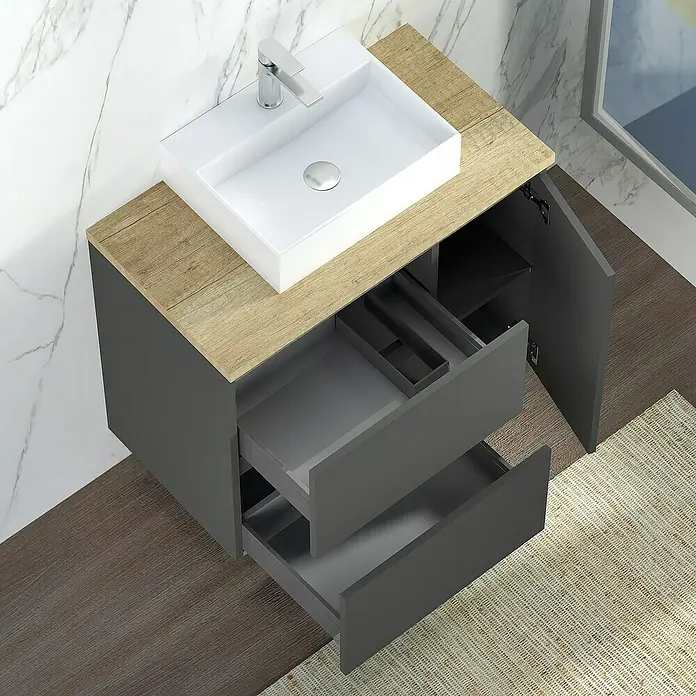 Artysan Mueble bajo de lavabo Farbe - 46 x 120 x 66 cm, Antracita - La imagen muestra un moderno mueble de baño gris con elementos de madera y un lavabo sobre encimera blanco. Los cajones del mueble están abiertos.