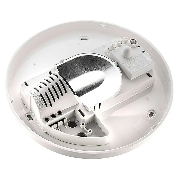Steinel Sensor-Wand- & Deckenleuchte RS 16 L weiß - 60 W, L x B x H: 27,5 x 27,5 x 9,5 cm, Weiß, E27 - Innenansicht einer weißen runden Deckenleuchte mit Metallelementen und Fassung für eine Glühbirne bis maximal 60W.