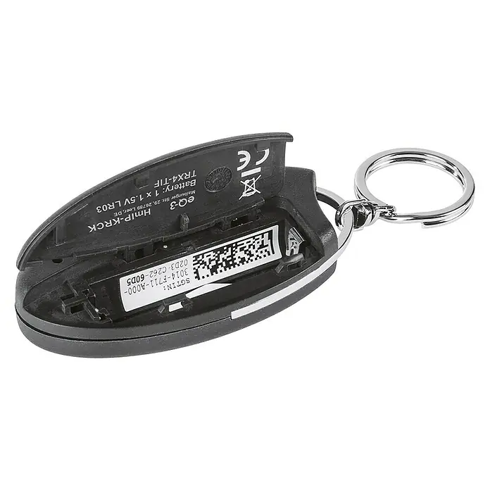Homematic IP Funkfernbedienung HmIP-KRCK - Passend für: Homematic IP Türschlossantrieb, Schwarz, 75 x 38 x 14 mm - Nahaufnahme eines geöffneten, schwarzen Schlüsselanhängers mit sichtbarer Batterie und Seriennummer.