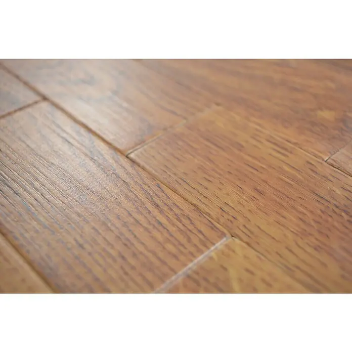 Selbstklebemosaik SAM 4SW8E - 30 x 30 cm, Braun, Matt - Nahaufnahme eines frisch verlegten Holzlaminatbodens mit warmer Farbgebung und sichtbarer Maserung.