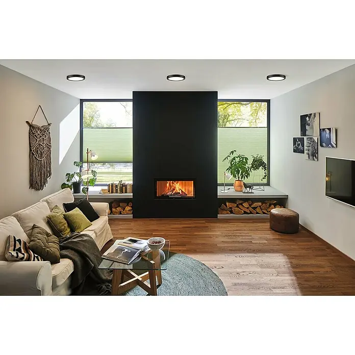 Paulmann Panel LED redondo Abia - 24 W, Negro, Blanco cálido - Diseño moderno de sala de estar con foco en luces de techo empotradas, destacando el ambiente acogedor. Iluminación elegante para un hogar con estilo.