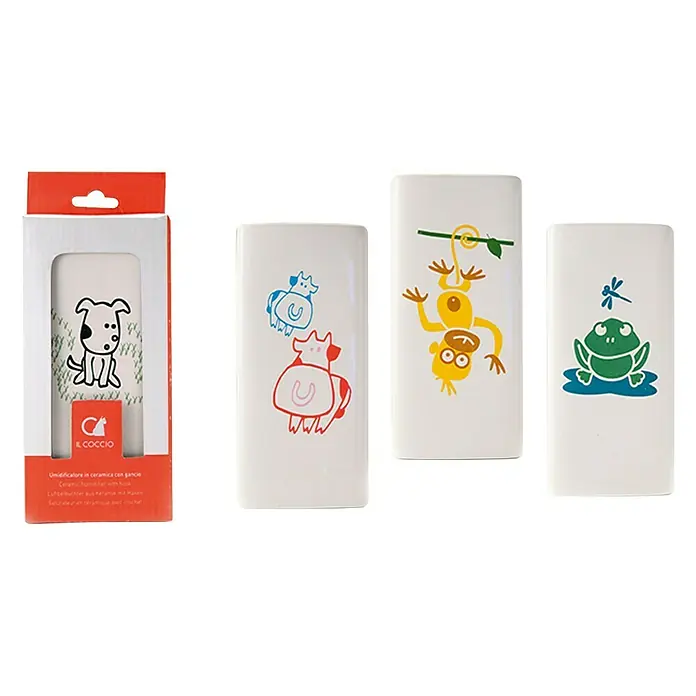 Humidificador para radiador infantil - Cerámica - Cuatro humidificadores de cerámica con diseños de perro, vaca, mono y rana, empaquetados en una caja roja.