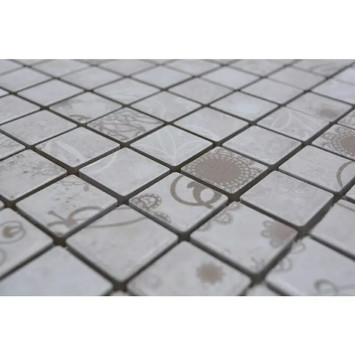 Mosaikfliese Quadrat LACEO LB 106 - 29,8 x 29,8 cm, Grau, Matt - Nahaufnahme von beigen quadratischen Mosaikfliesen mit verschiedenen floralen Mustern, die für eine elegante und dekorative Oberfläche sorgen.
