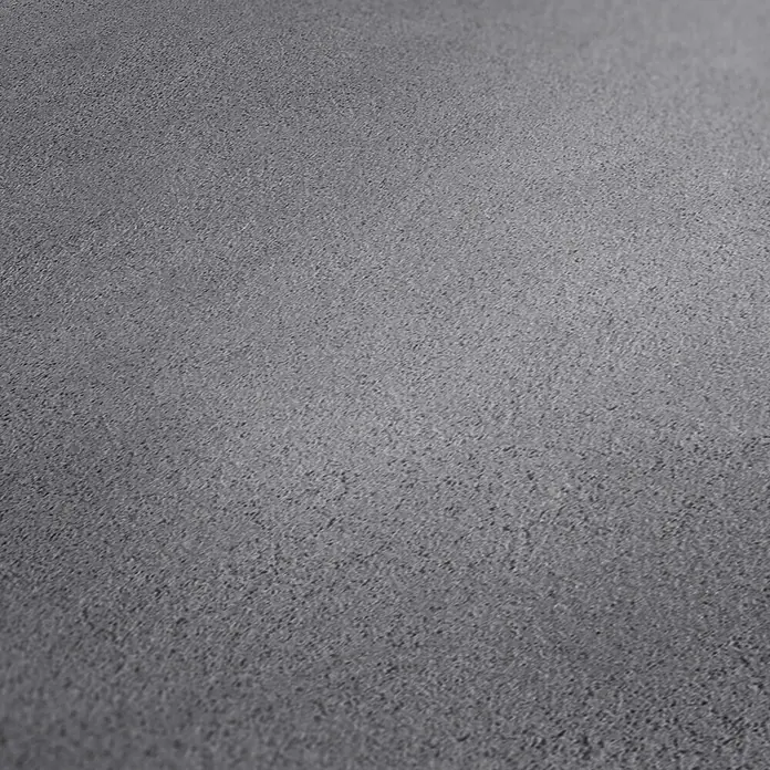 A.S. Création Elements Vliestapete - Dunkelgrau, Uni, 10,05 x 0,53 m - Ein vergrößerter Blick auf eine gleichmäßige, graue Oberfläche. Die Textur erscheint rau und erinnert an Beton oder Asphalt.