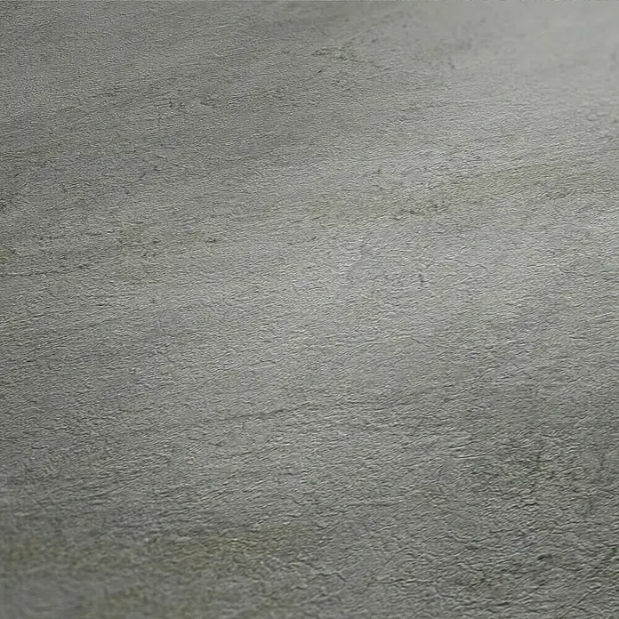 A.S. Création Elements Vliestapete - Betongrau, Betonoptik, 10,05 x 0,53 m - Nahaufnahme einer strukturierten, grauen Oberfläche, die an Stein oder Beton erinnert. Die ungleichmäßige Textur erzeugt ein interessantes Licht- und Schattenspiel.