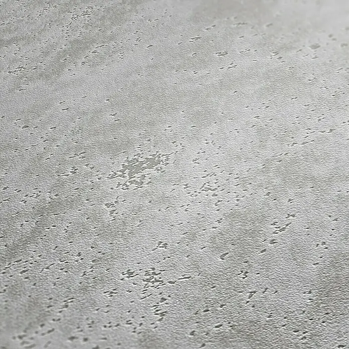 A.S. Création Elements Vliestapete Uni - Grau, Betonoptik, 10,05 x 0,53 m - Detailaufnahme einer grauen Betonstruktur, die eine raue und leicht unebene Oberfläche zeigt, ideal für moderne Designanwendungen.
