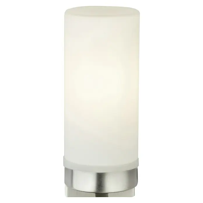 Globo Aplique de pared Space - 40 W, L x An x Al: 110 x 80 x 185 mm, Níquel mate, E14 - Un primer plano muestra una moderna lámpara de mesa cilíndrica con base plateada y pantalla blanca opalina, que emite una luz cálida y acogedora.