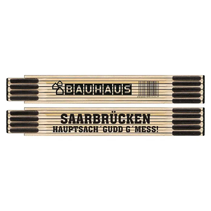 BAUHAUS Zollstock - SAARBRÜCKEN HAUPTSACH'GUDD G'MES!, 2 m - Ein Zollstock mit dem Bauhaus-Logo und dem Schriftzug „Saarbrücken, Hauptsach gudd g’mess!“, ein lustiger Zimmermann-Zollstock.